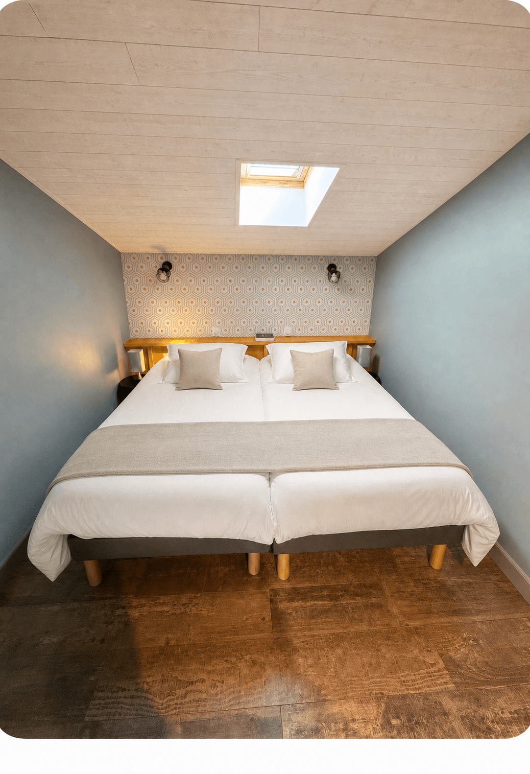 Chambre avec deux lits simples réunissables